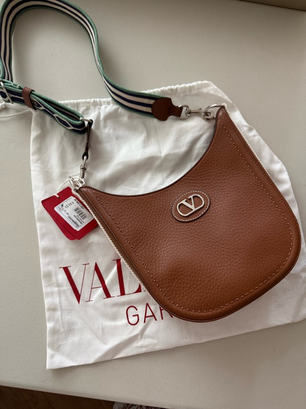 Valentino Garavani Tan Pebbled Leather Shoulder Bag with Striped Strap